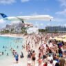 Plane Flying over the Maho Beach Saint Martin and Sint Maarten Island, Caribbean