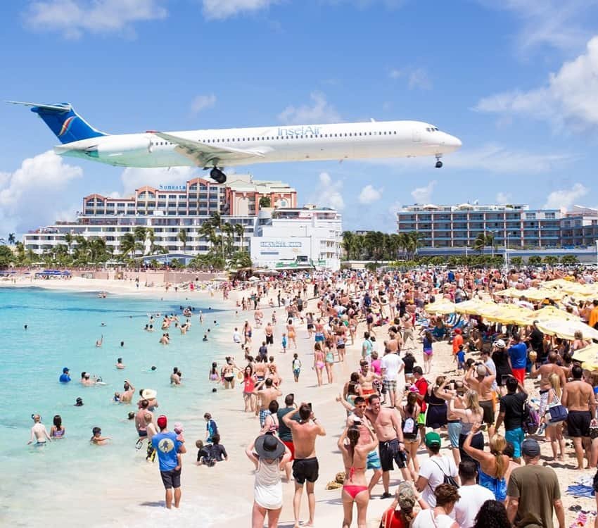 Plane Flying over the Maho Beach Saint Martin and Sint Maarten Island, Caribbean